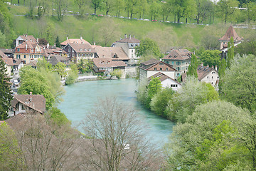 Image showing Stunning view of a beautiful town around the lake during the sum