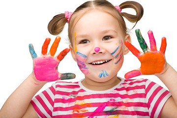 Image showing Portrait of a cute girl with painted hands