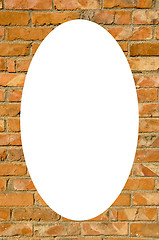 Image showing Red brick wall and white oval in center 