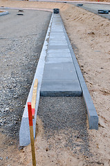 Image showing New sidewalk construction and rubble poured 