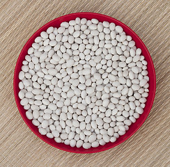 Image showing White beans in a red bowl