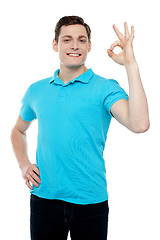 Image showing Smiling guy with an excellent gesture