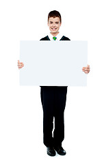 Image showing Young boy showing blank billboard