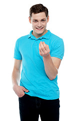 Image showing Smart young smiling guy posing in style