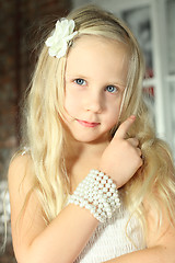 Image showing Child with blond hair - beautiful young girl close-up