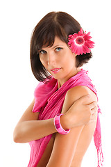 Image showing Beautiful brunette woman with pink flower