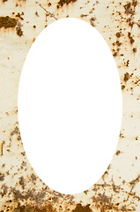 Image showing Rusty metal plate  and white oval in center 