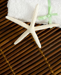 Image showing Beauty Treatment - White Star on Bamboo Background