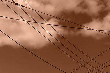 Image showing powerlines with clouds monotone