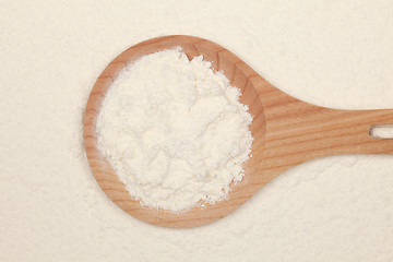 Image showing Flour on a wooden spoon