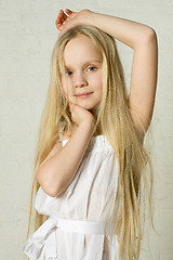 Image showing Smiling blonde girl with long hair