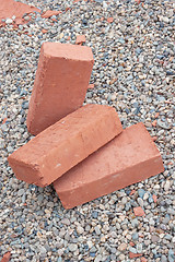 Image showing Three red clay bricks