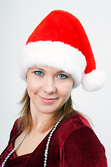 Image showing attractive young woman a Christmas hat