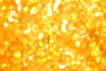 Image showing Christmas glittering background. Golden bokeh - abstract texture