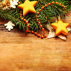 Image showing Christmas retro background with decoration and Xmas tree branch