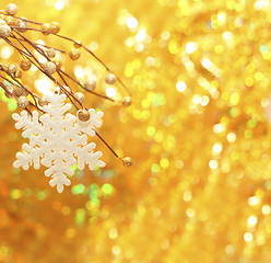 Image showing Christmas border with snowflake on gold background