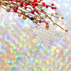 Image showing Christmas snowflake and decoration on silver background