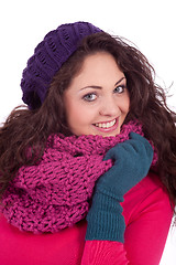 Image showing beautiful young smiling girl with hat and scarf in winter