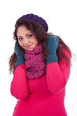 Image showing beautiful young smiling girl with hat and scarf in winter