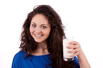 Image showing beautiful smiling woman is drinking milk