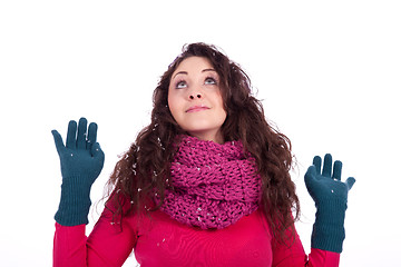 Image showing beautiful smiling brunette woman in snow in winter 