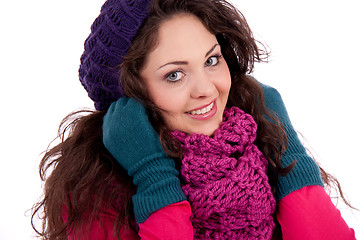 Image showing beautiful young smiling girl with hat and scarf in winter