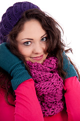Image showing beautiful young smiling girl with hat and scarf in winter