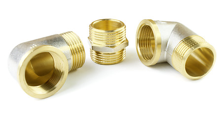 Image showing Three brass fitting on a white background