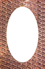 Image showing Rusty metal bridge fragment white oval in center 