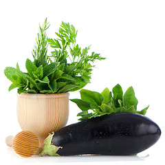 Image showing Eggplant and green herb leafs 