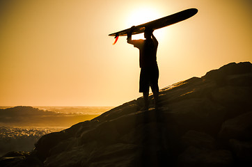 Image showing Long boarder watching the waves