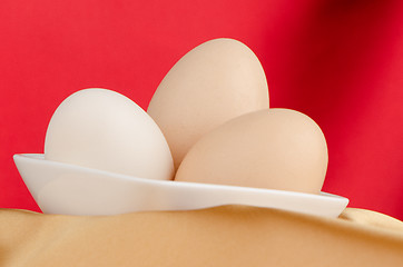 Image showing Three eggs in the bowl 