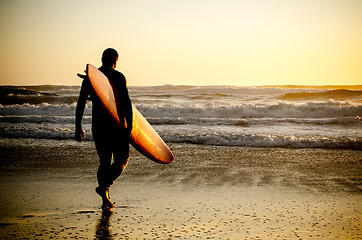 Image showing Surfer walking