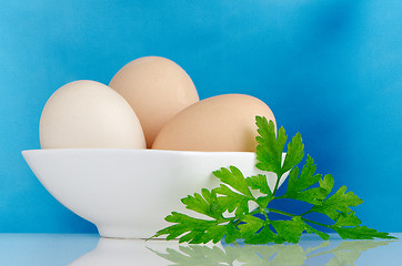 Image showing Three eggs in the bowl 