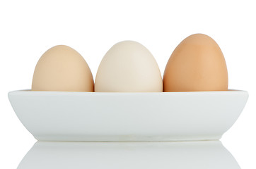 Image showing Brown eggs in white ceramic bowl