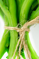 Image showing Green vegetables tied with rafia