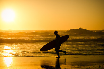 Image showing Surfer running