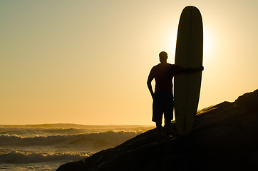 Image showing Long boarder watching the waves