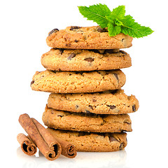 Image showing Tasty oat biscuits with cinnamon sticks