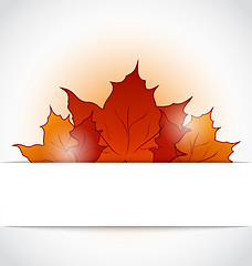 Image showing Autumnal maple leaves sticking out of the cut paper