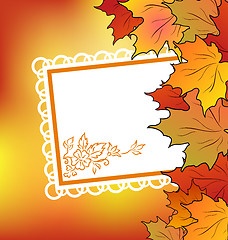 Image showing Autumn maple leaves with floral greeting card