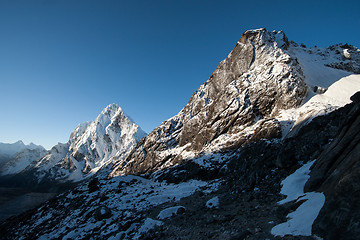 Image showing Cho La pass peaks at dawn in Himalaya mountains