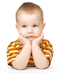 Image showing Portrait of a cute little boy looking at something