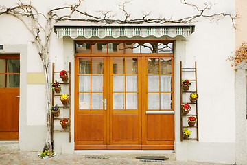 Image showing house door and huge flower jar, Lausanne, Switzerland