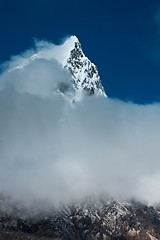 Image showing Cholatse mountain peak and clouds