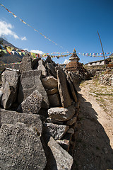 Image showing Mani stones and Buddhist stupe or chorten in Himalayas