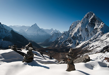 Image showing Cho La pass and stone stacks at daybreak in Himalayas