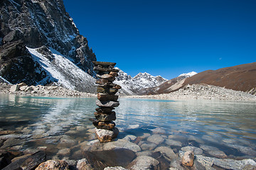 Image showing Buddhism: Stones and Sacred Lake near Gokyo