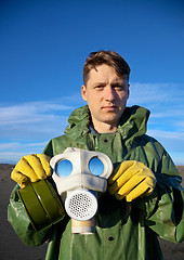 Image showing Man in a overalls with a gas mask