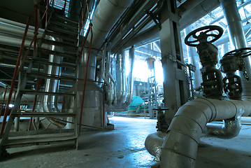 Image showing Equipment, cables and piping as found inside of  industrial powe